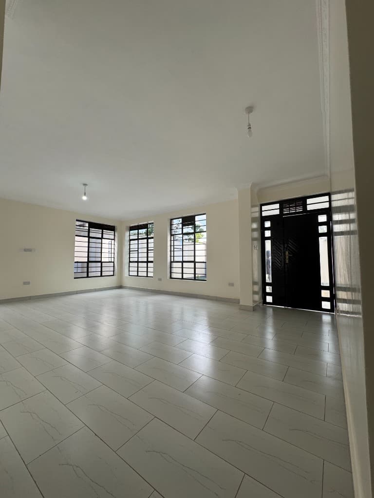 Living room with front door entry